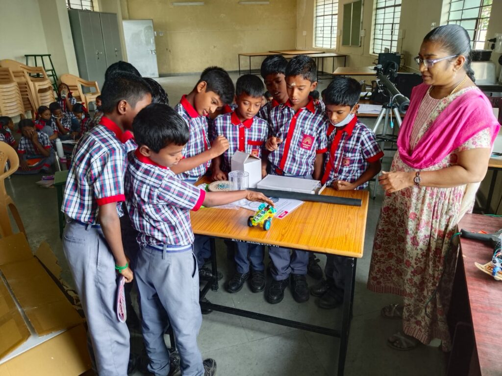School students performing experiments using STEM Lab Kits